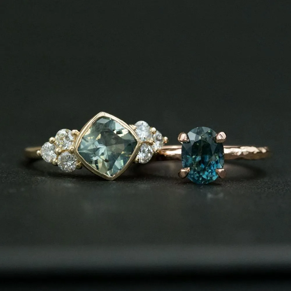 Minty Cushion Cut Sapphire Ring with Diamond Cluster Side Stones in Bezel Yellow Gold