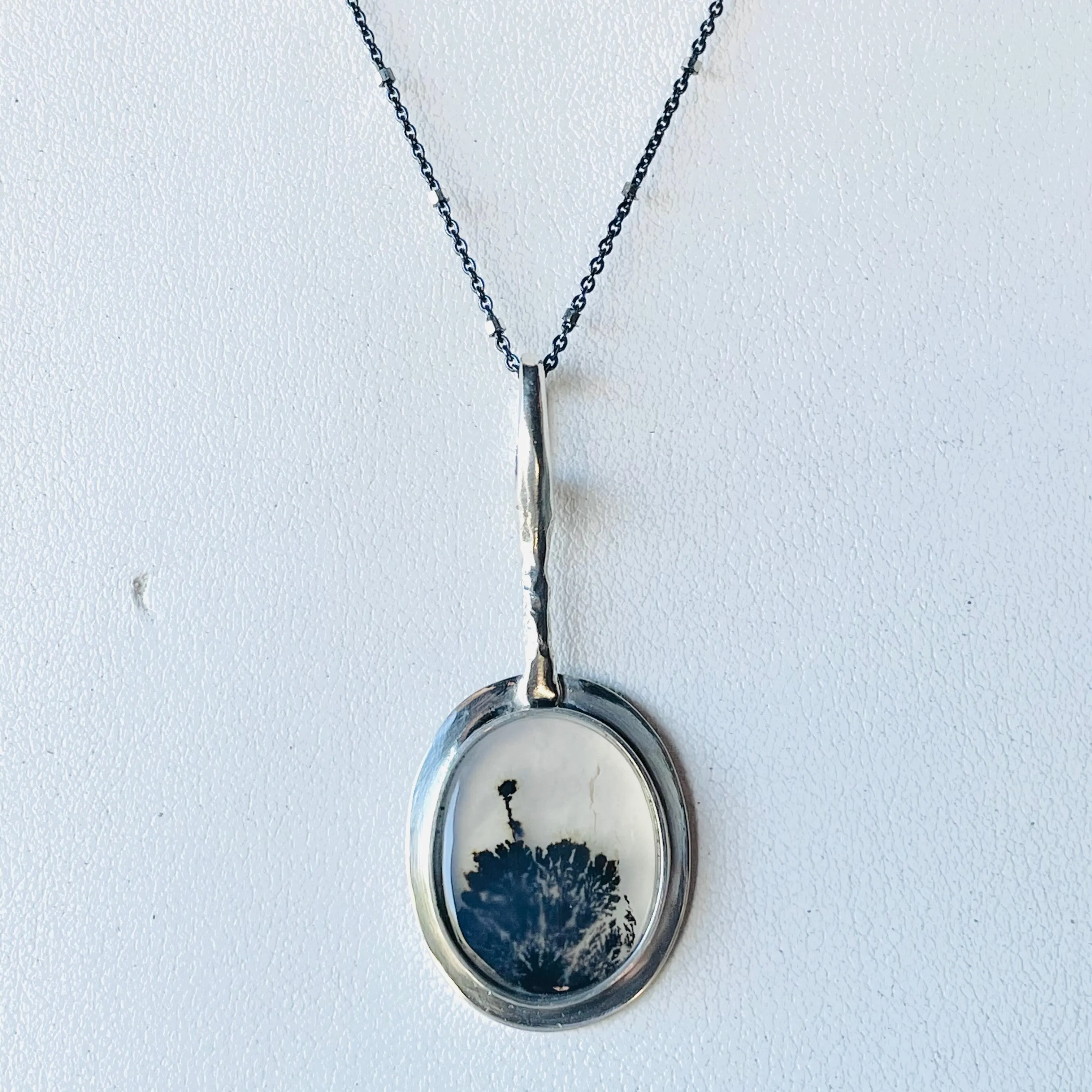 Rise above necklace