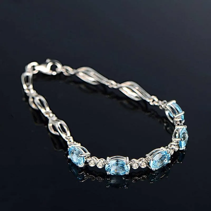 Sterling Silver Blue Topaz Charm Bracelet