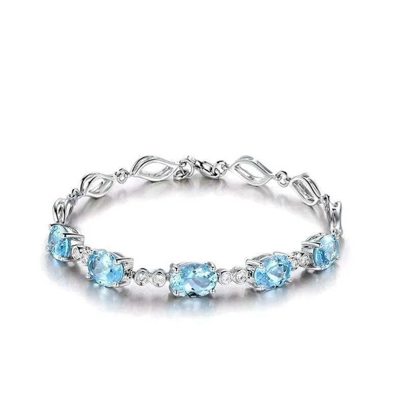 Sterling Silver Blue Topaz Charm Bracelet